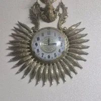 ساعت دیواری و چوب لباسی و جا کلیدی