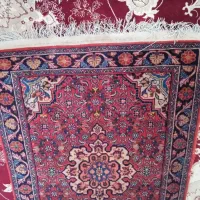 یک عدد فرش دستباف