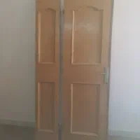 ۲ عدد درب چوبی دو لنگه همراه با چهارچوب اهنی