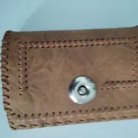 کارت بانکی داخل یه کیف قهوه ای بنام هانیه هدایتی
