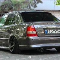 سپر عقب مزدا 323 همراه با لیپ اسپید