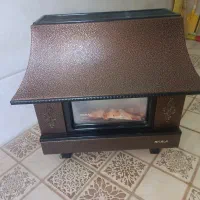 بخاری شومینه گازی نیک کالا 24000 در حد نو