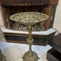 میوه خوری بلند کنار سالنی برنز + ساعت دیواری برنز