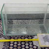 اکواریوم و تور ماهی گیری