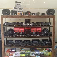 شیشه دودی سیار و روکش وسیستم صوتی اقساطی