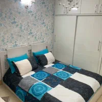 لوستر شیشه ای سفید به همراه دیوار کوب