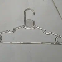 چوب لباسی وگیره ورگال ویترین مخصوص لباس