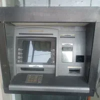 یک دستگاه عابر بانک  مثل عابر بانکهای بانک