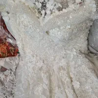 لباس عروس خاص دست دوز پرکار گن دوزی شده و تور سر