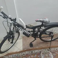 دوچرخه کمک وسط و کمک جلو.