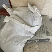 سیمان و ماسه استفاده نشده آکبند