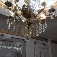 وسایل برنجی لوستر.ساعت.میزکنارسالنی.سطل وجا دستمال