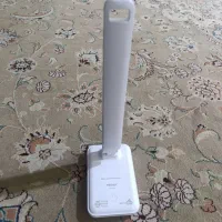 چراغ مطالعه و گردن بند
