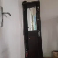 جاکفشی همراه با چوب لباسی و دارای آینه قدی