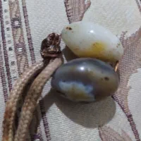 مهره قدیمی هزارساله تماس
