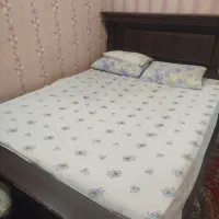 تخت خواب دونفره همراه با زیر تختی و تشک رویال