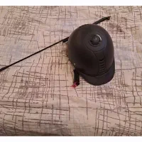 شلاق و کلاه مخصوص سوار کاری