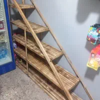 تعدادی میزوقفسه چوبی فلزی