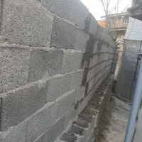 نازمند کارگر ساختمانی جابه جای خاک ومصالح