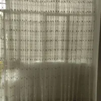 پرده تور صدفی طرح شکوفه یک ۶متربا یک ۳متر