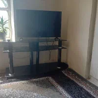 زیر تلویزیون شیشه ای