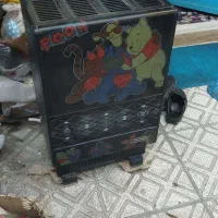 بخاری گازی و یخچال و تلویزیون و فرش