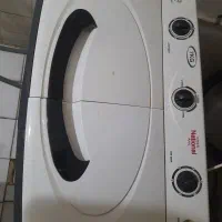 ماشین لباسشویی دوقلو .بخاری گازی
