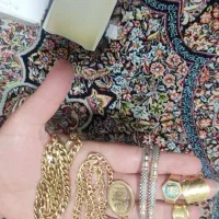 طلا فروشی در هرسین 50گرم تابلو و 200