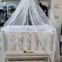 گهواره تخت کنار مادر