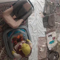 روروئک عروسک قنداق فرنگی کیف محافظ تخت