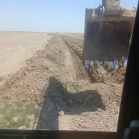 اجاره دو دستگاه بیل میکانیکی