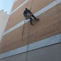 کار در اتفاع شستشوی نما پیچ ورول پلاک