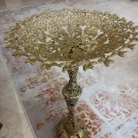 ظرف میوه خوری کنار سالنی برنجی
