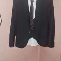 کت شلوار کودک یا نوجوان