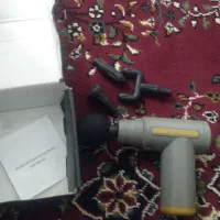 ماساژور تفنگی سالم و کم‌کارکرد، تمیز و باکیفیت