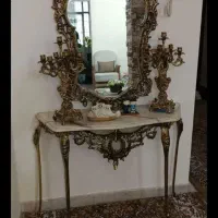 فروشنده و خریدار اینه و شعمدان برنزی و وسایل برنزی