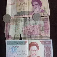 تعدادی اسکناس و سکه قدیمی