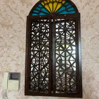 پنجره آینه دار گره چینی