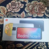 یک عدد گوشی شیائومی نوت ۹