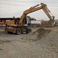 بیل مکانیکی لاستیکی