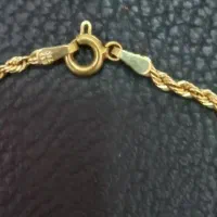 زنجیر یزدی تقریبا ضخیم و کوتاه و کاملا نو