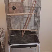قفس پرنده بزرگ همراه وسایل در حد نو