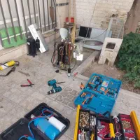 نصاب تعمیرکار اسپیلیت کولرگازی پنجره ای یخچال