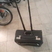 یک عدد چمدان ساک پرواز