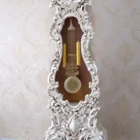 بوفه چوبی و ساعت ایستاده
