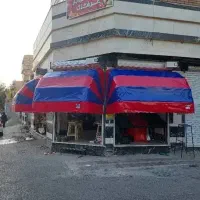 خیمه سایبان مغازه رنگ آبی قرمزمات آفتابگیر فروشگاه