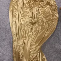 پرده ساتن طلایی رنگ