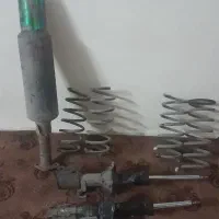 کمک ۲۰۶ کمک پراید منبع اگزور زنجیر چرخ فنر پراید