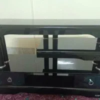 میز تلوزیون شیشه