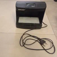 دستگاه لیزری چک پول magner